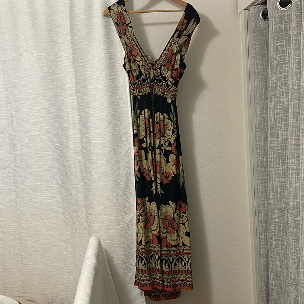 New Angie maxi dress with adorable cutout and tie in back.